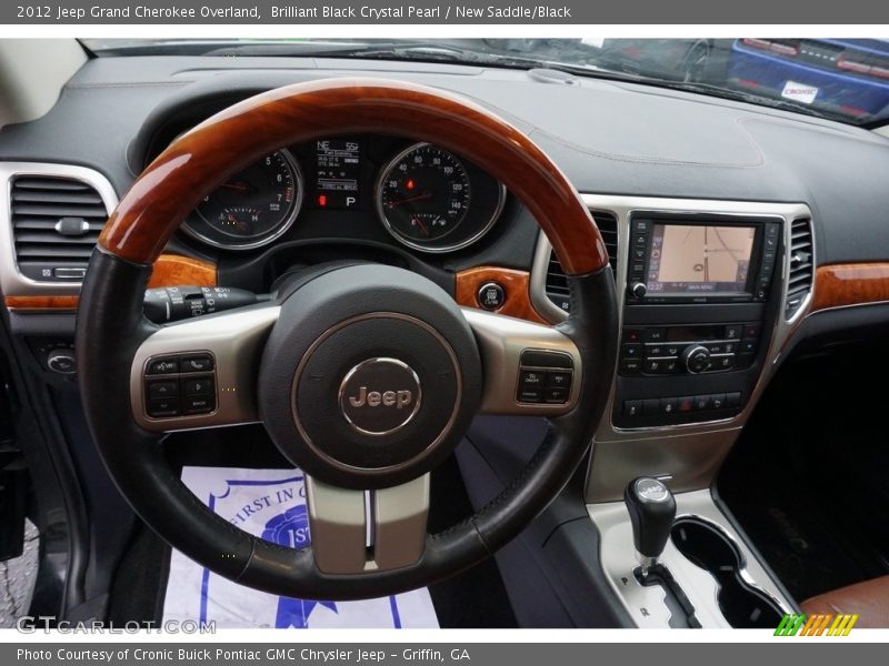 Brilliant Black Crystal Pearl / New Saddle/Black 2012 Jeep Grand Cherokee Overland