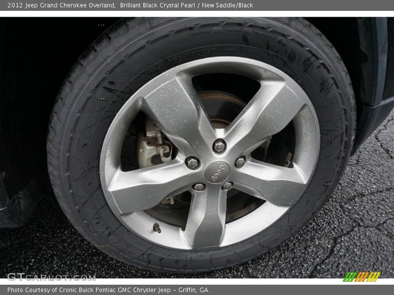Brilliant Black Crystal Pearl / New Saddle/Black 2012 Jeep Grand Cherokee Overland