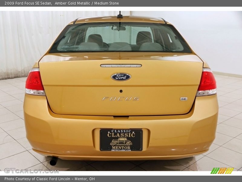 Amber Gold Metallic / Medium Stone 2009 Ford Focus SE Sedan