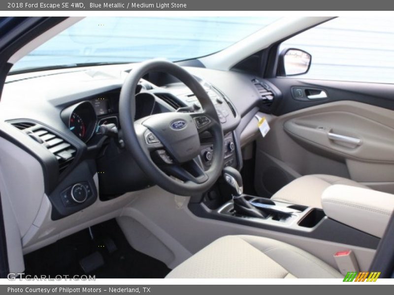 Blue Metallic / Medium Light Stone 2018 Ford Escape SE 4WD