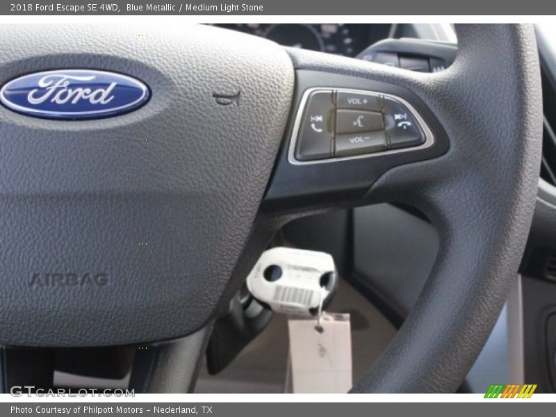 Blue Metallic / Medium Light Stone 2018 Ford Escape SE 4WD