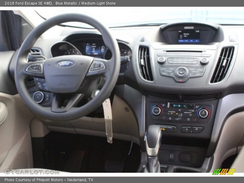 Blue Metallic / Medium Light Stone 2018 Ford Escape SE 4WD