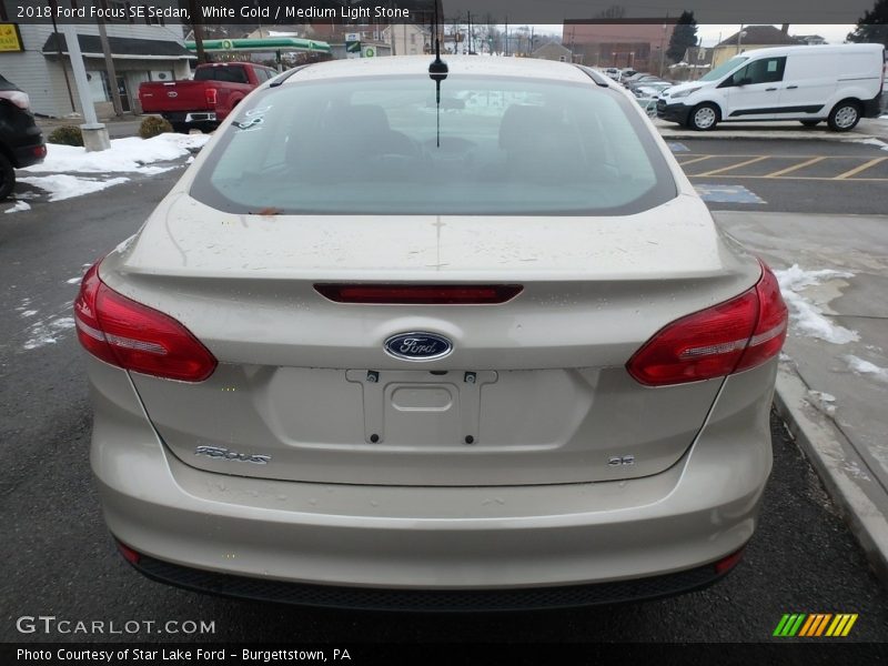 White Gold / Medium Light Stone 2018 Ford Focus SE Sedan