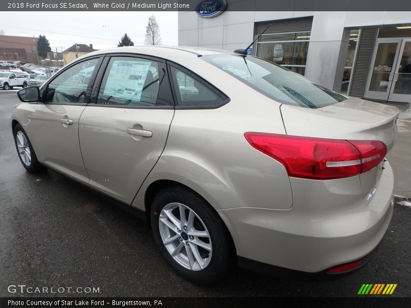 White Gold / Medium Light Stone 2018 Ford Focus SE Sedan