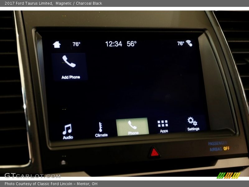 Magnetic / Charcoal Black 2017 Ford Taurus Limited