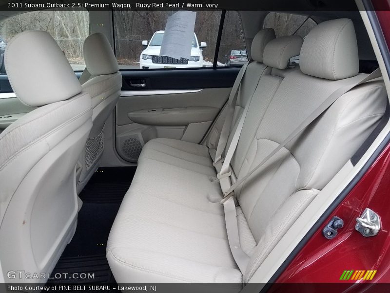 Ruby Red Pearl / Warm Ivory 2011 Subaru Outback 2.5i Premium Wagon