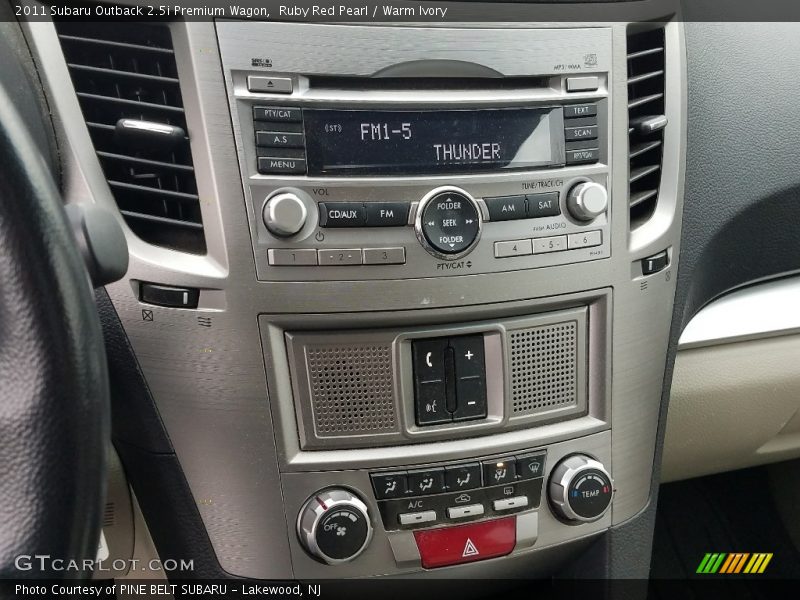 Ruby Red Pearl / Warm Ivory 2011 Subaru Outback 2.5i Premium Wagon