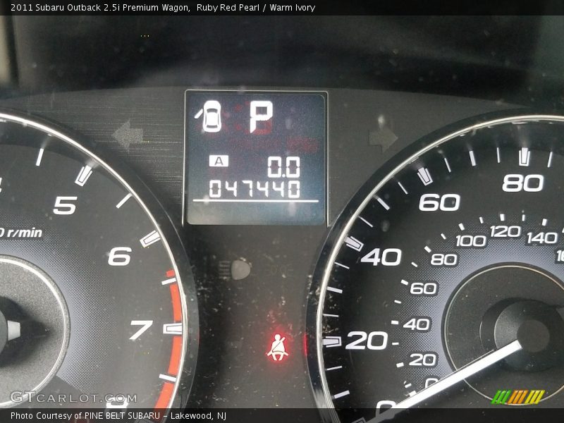 Ruby Red Pearl / Warm Ivory 2011 Subaru Outback 2.5i Premium Wagon