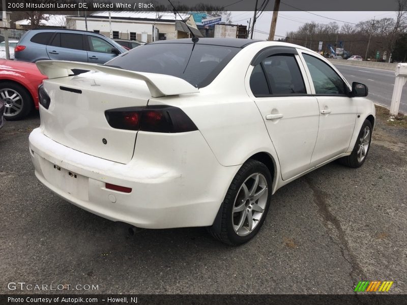 Wicked White / Black 2008 Mitsubishi Lancer DE