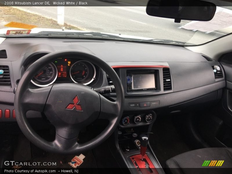 Wicked White / Black 2008 Mitsubishi Lancer DE
