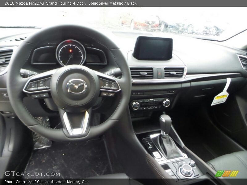 Sonic Silver Metallic / Black 2018 Mazda MAZDA3 Grand Touring 4 Door