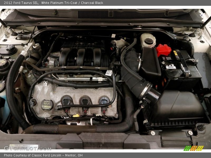 White Platinum Tri-Coat / Charcoal Black 2012 Ford Taurus SEL