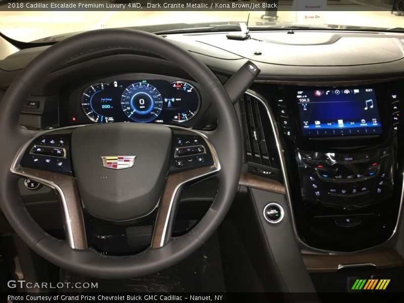 Dark Granite Metallic / Kona Brown/Jet Black 2018 Cadillac Escalade Premium Luxury 4WD