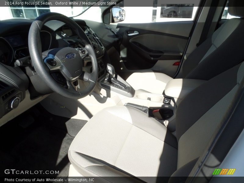 Oxford White / Medium Light Stone 2014 Ford Focus SE Sedan