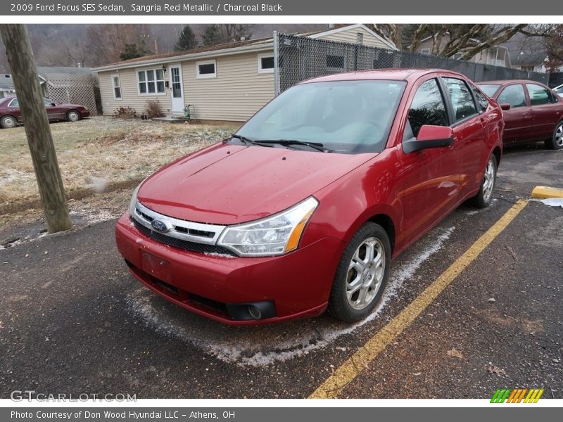 Sangria Red Metallic / Charcoal Black 2009 Ford Focus SES Sedan