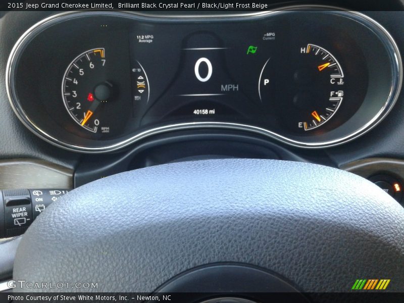Brilliant Black Crystal Pearl / Black/Light Frost Beige 2015 Jeep Grand Cherokee Limited