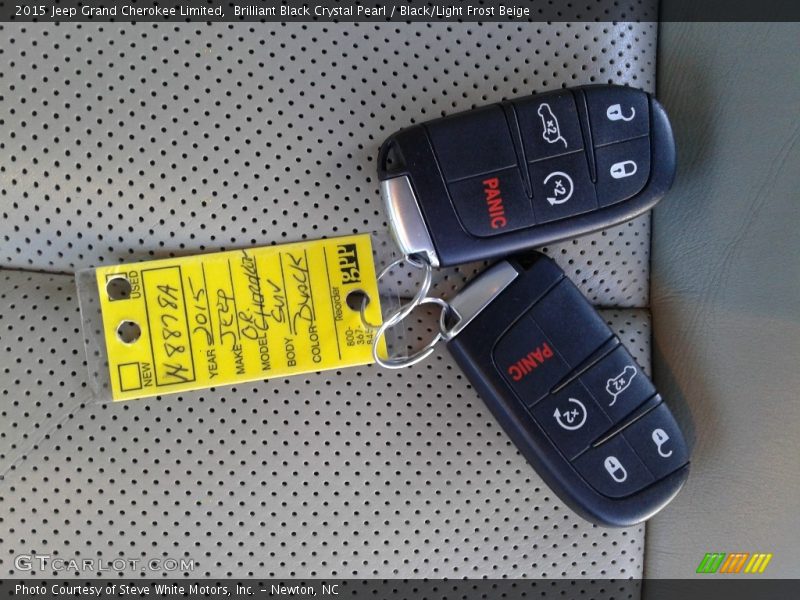 Brilliant Black Crystal Pearl / Black/Light Frost Beige 2015 Jeep Grand Cherokee Limited