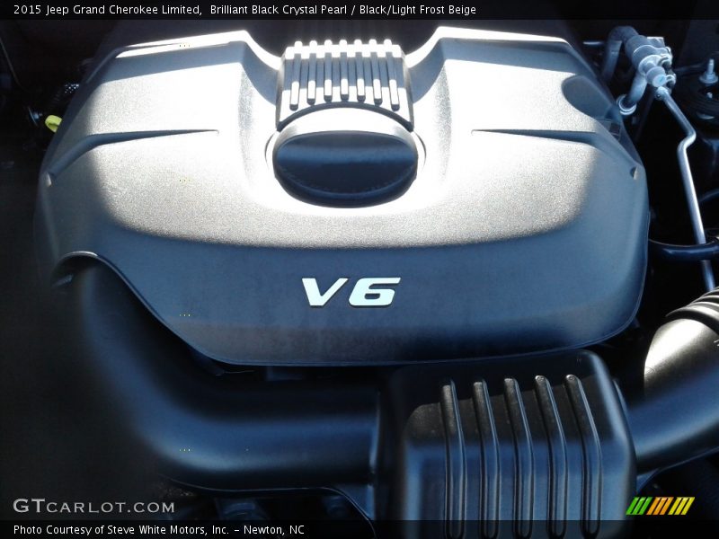 Brilliant Black Crystal Pearl / Black/Light Frost Beige 2015 Jeep Grand Cherokee Limited