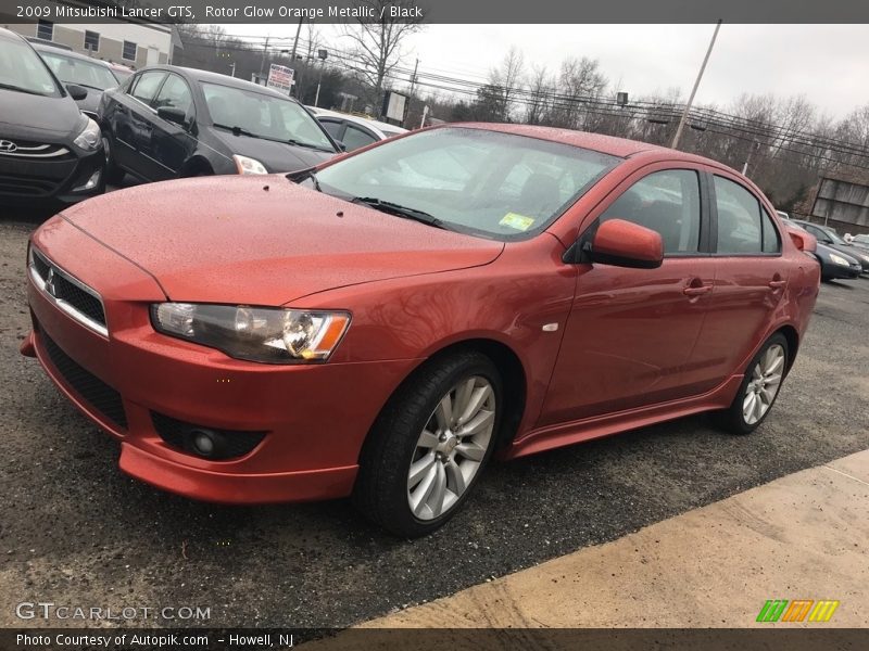 Rotor Glow Orange Metallic / Black 2009 Mitsubishi Lancer GTS