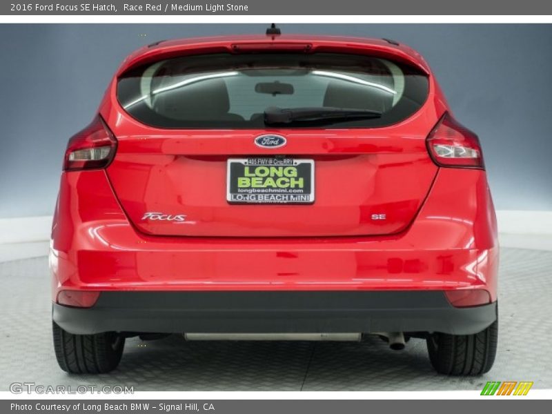 Race Red / Medium Light Stone 2016 Ford Focus SE Hatch