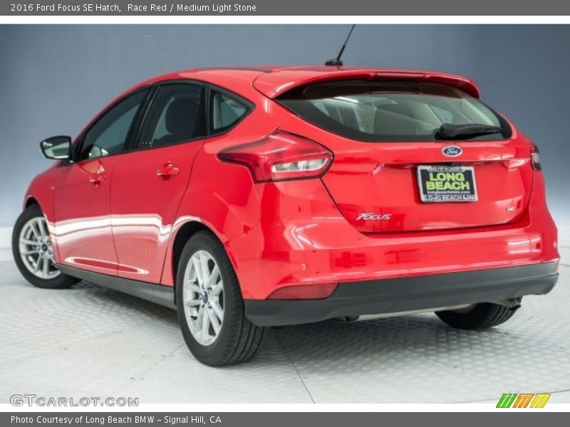 Race Red / Medium Light Stone 2016 Ford Focus SE Hatch