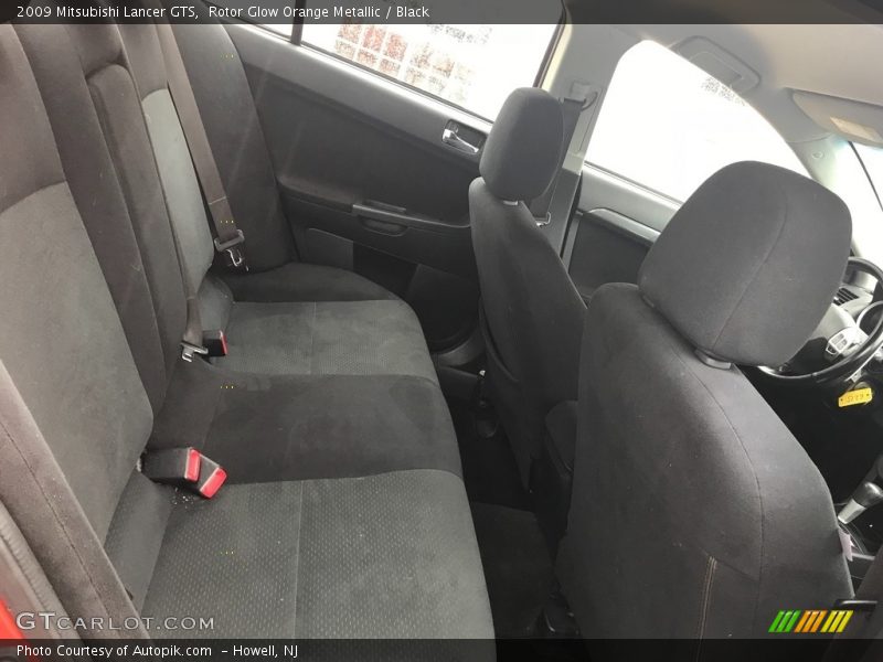 Rotor Glow Orange Metallic / Black 2009 Mitsubishi Lancer GTS