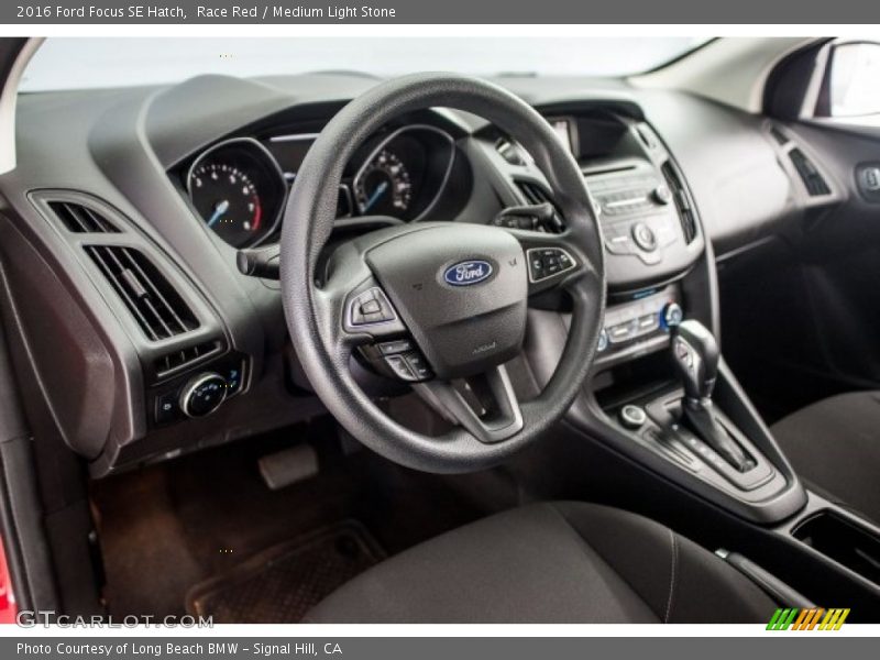 Race Red / Medium Light Stone 2016 Ford Focus SE Hatch