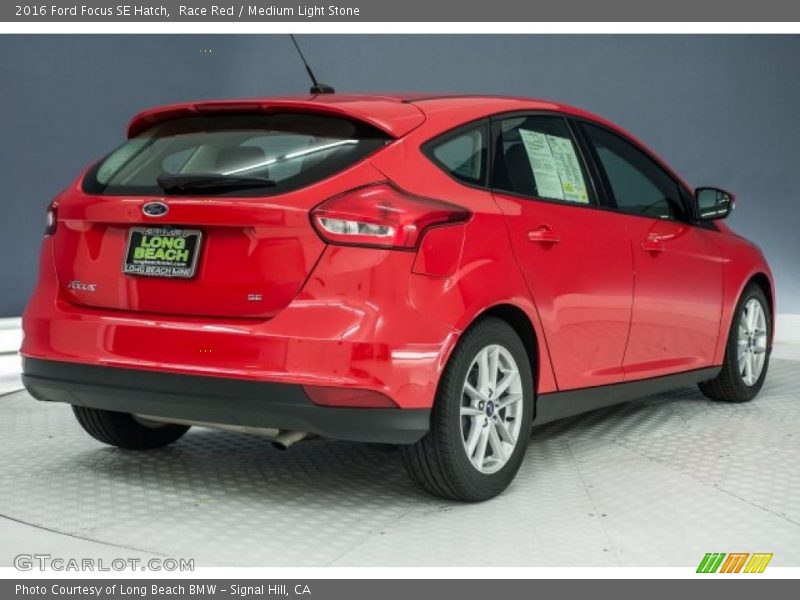 Race Red / Medium Light Stone 2016 Ford Focus SE Hatch