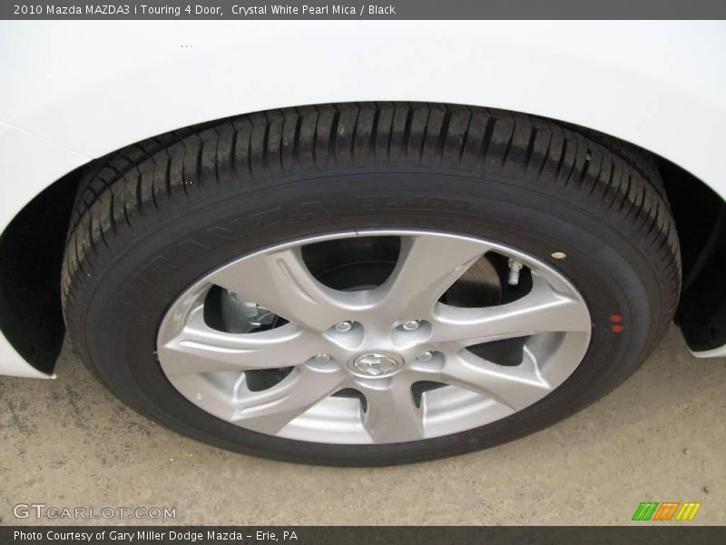 Crystal White Pearl Mica / Black 2010 Mazda MAZDA3 i Touring 4 Door