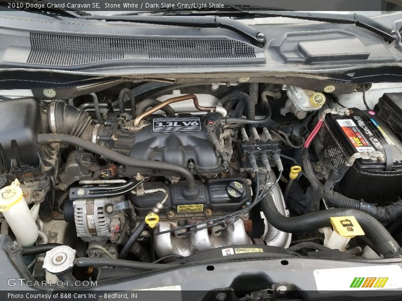 Stone White / Dark Slate Gray/Light Shale 2010 Dodge Grand Caravan SE