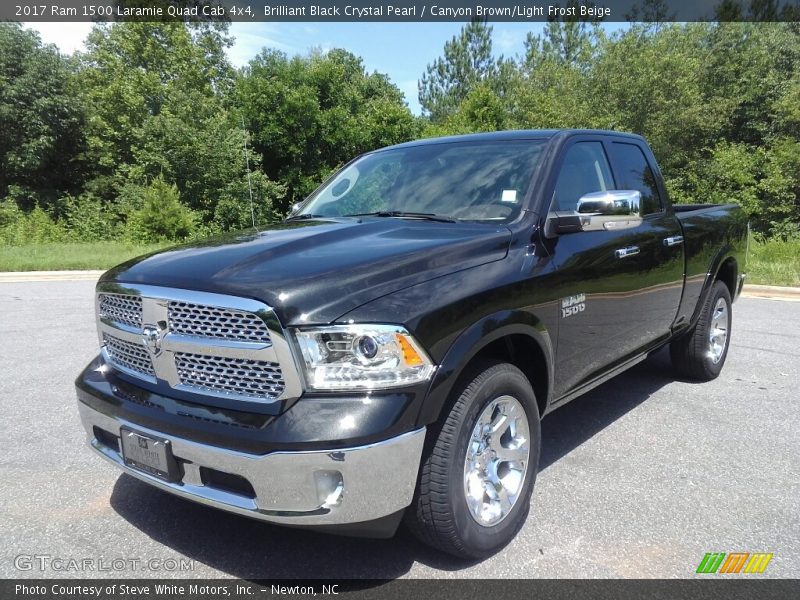 Brilliant Black Crystal Pearl / Canyon Brown/Light Frost Beige 2017 Ram 1500 Laramie Quad Cab 4x4