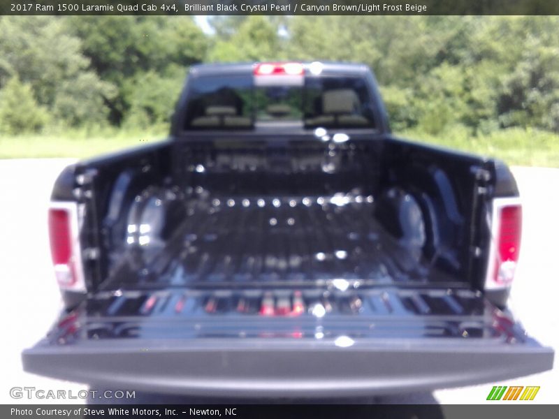 Brilliant Black Crystal Pearl / Canyon Brown/Light Frost Beige 2017 Ram 1500 Laramie Quad Cab 4x4