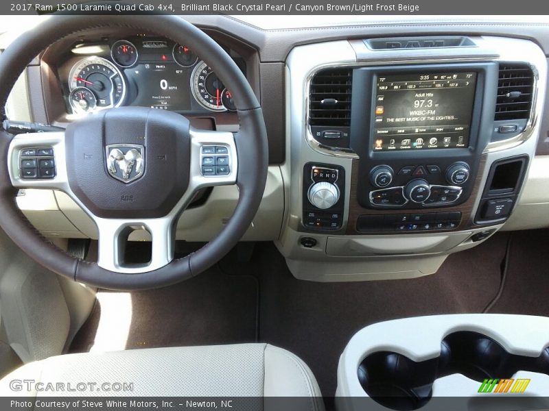 Brilliant Black Crystal Pearl / Canyon Brown/Light Frost Beige 2017 Ram 1500 Laramie Quad Cab 4x4