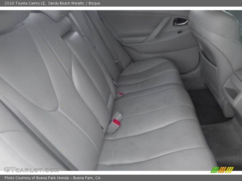 Sandy Beach Metallic / Bisque 2010 Toyota Camry LE