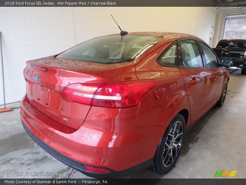 Hot Pepper Red / Charcoal Black 2018 Ford Focus SEL Sedan