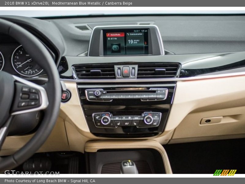 Mediterranean Blue Metallic / Canberra Beige 2018 BMW X1 xDrive28i