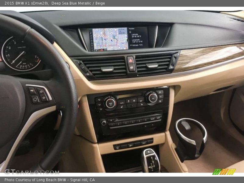 Deep Sea Blue Metallic / Beige 2015 BMW X1 sDrive28i