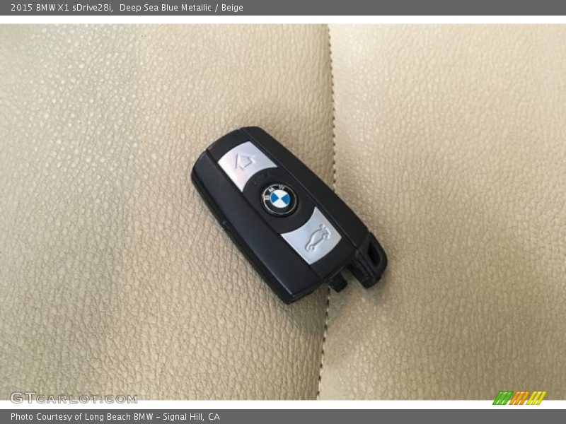 Deep Sea Blue Metallic / Beige 2015 BMW X1 sDrive28i