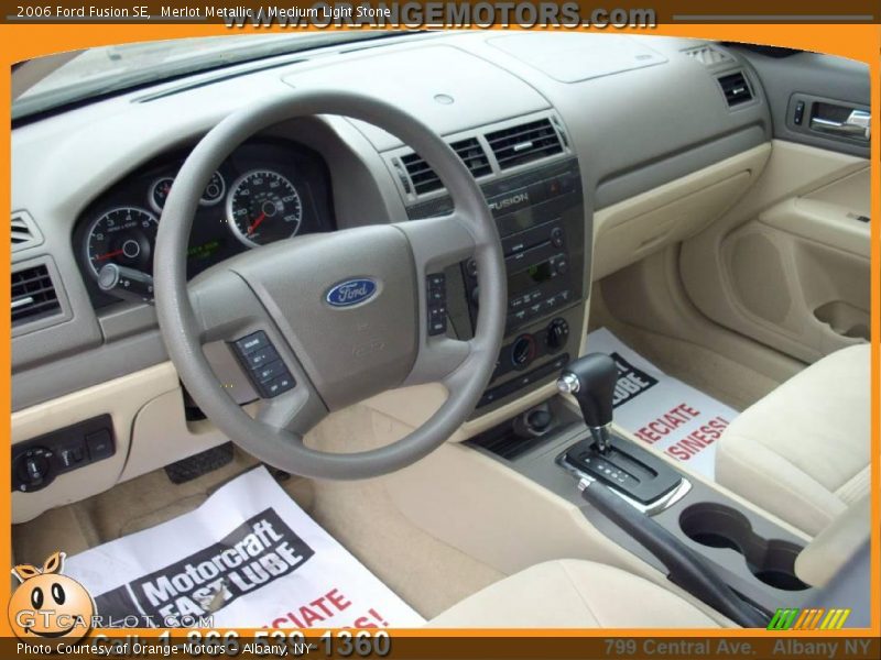 Merlot Metallic / Medium Light Stone 2006 Ford Fusion SE