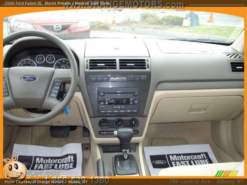 Merlot Metallic / Medium Light Stone 2006 Ford Fusion SE