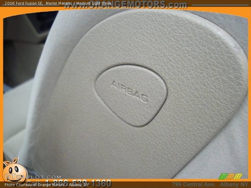 Merlot Metallic / Medium Light Stone 2006 Ford Fusion SE