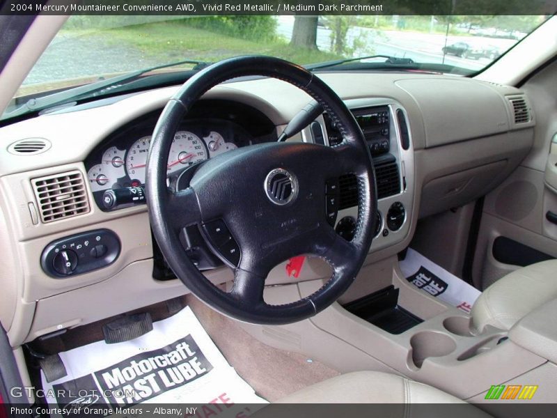 Vivid Red Metallic / Medium Dark Parchment 2004 Mercury Mountaineer Convenience AWD