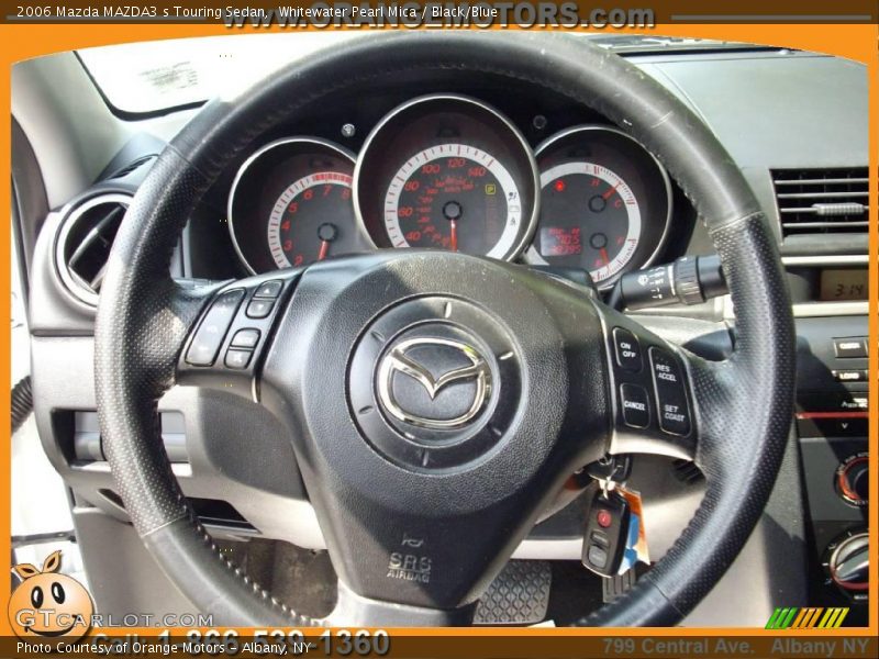 Whitewater Pearl Mica / Black/Blue 2006 Mazda MAZDA3 s Touring Sedan