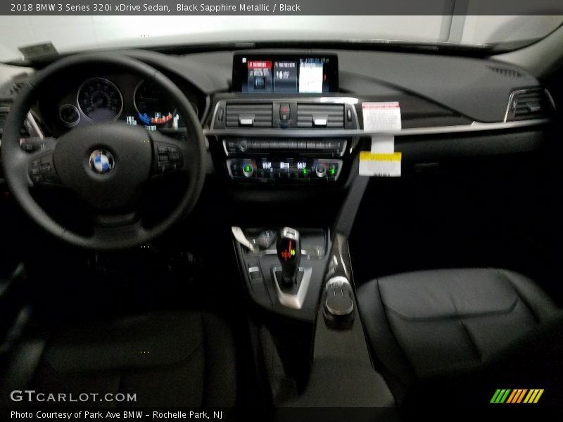 Black Sapphire Metallic / Black 2018 BMW 3 Series 320i xDrive Sedan
