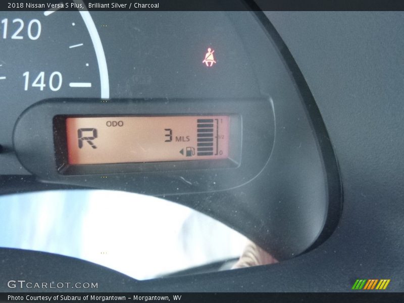 Brilliant Silver / Charcoal 2018 Nissan Versa S Plus