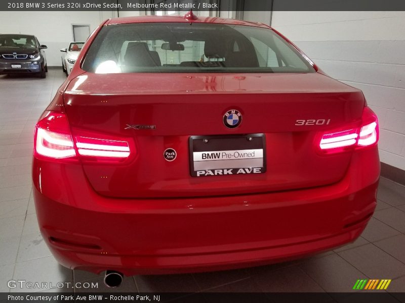 Melbourne Red Metallic / Black 2018 BMW 3 Series 320i xDrive Sedan