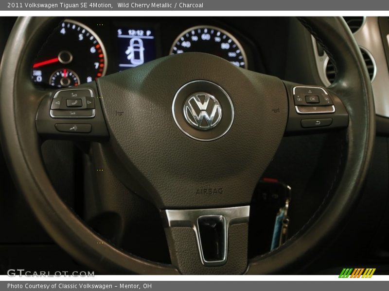 Wild Cherry Metallic / Charcoal 2011 Volkswagen Tiguan SE 4Motion