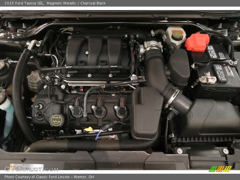 Magnetic Metallic / Charcoal Black 2015 Ford Taurus SEL