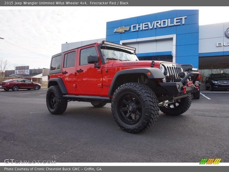 Firecracker Red / Black 2015 Jeep Wrangler Unlimited Willys Wheeler 4x4