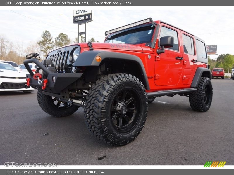 Firecracker Red / Black 2015 Jeep Wrangler Unlimited Willys Wheeler 4x4